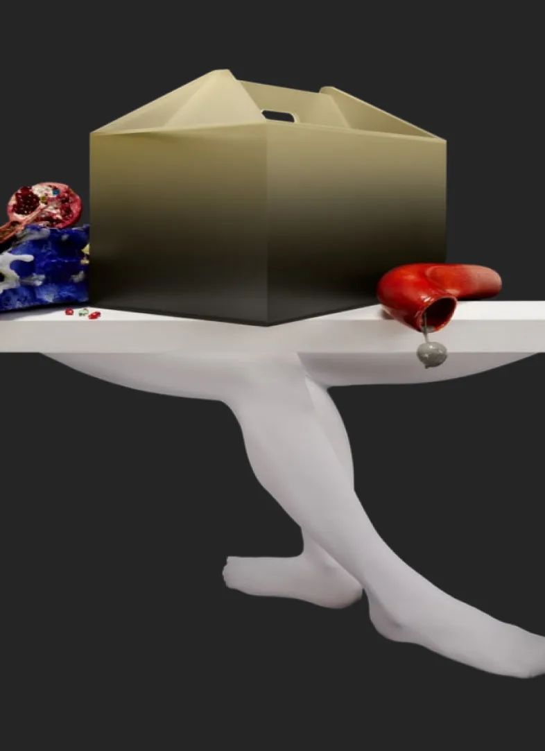 The box resting on a sculpted leg