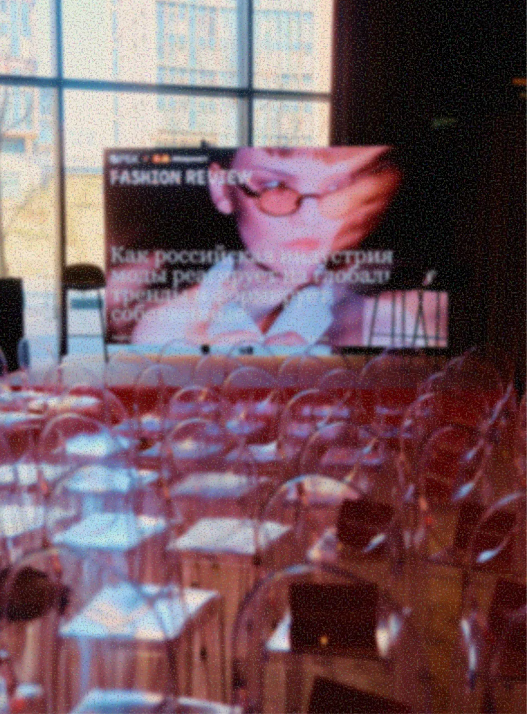 Fashion talk hall with red chairs