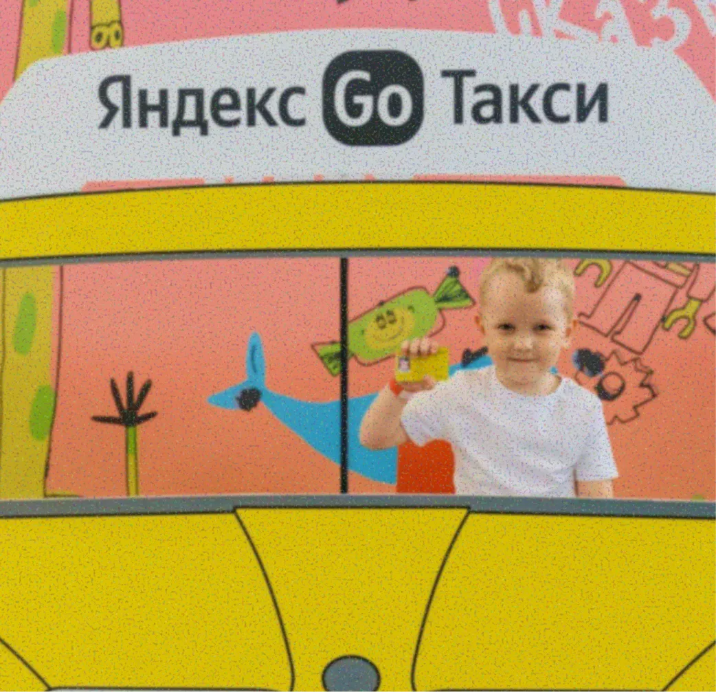 Child in a taxi photo booth