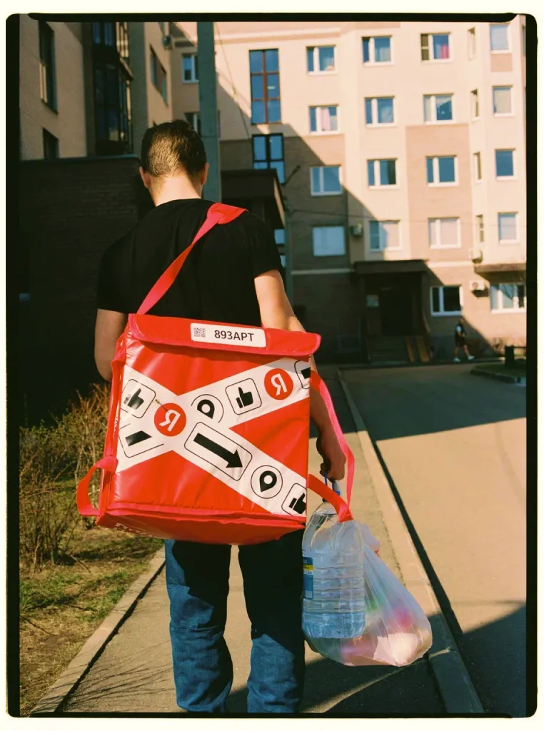 Courier with a red bag
