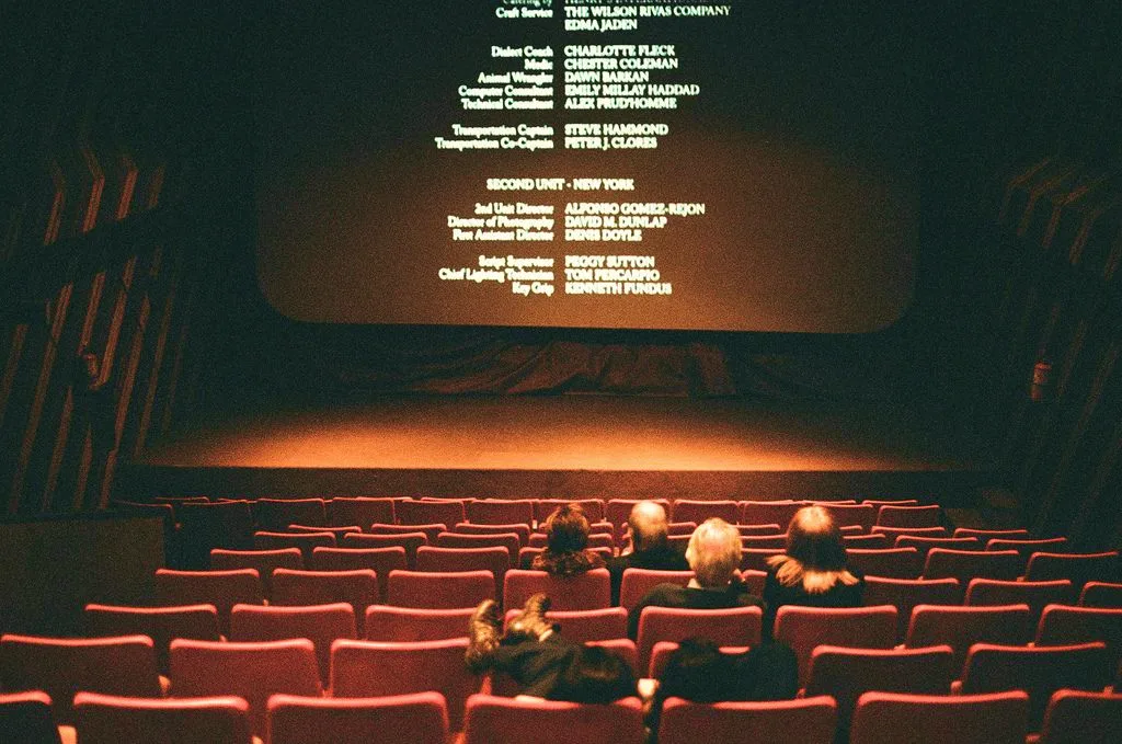 Cinema hall with credits on screen