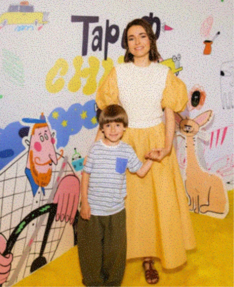 Author with a child at the book event