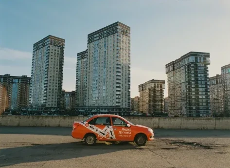 Taxi among new apartment blocks