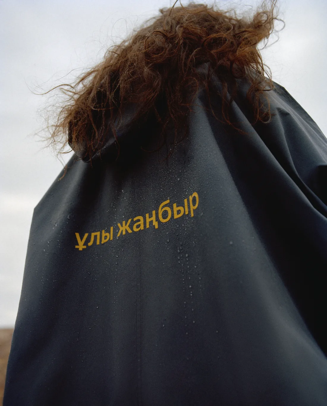 Raincoats cut like Kazakh national dress — 1