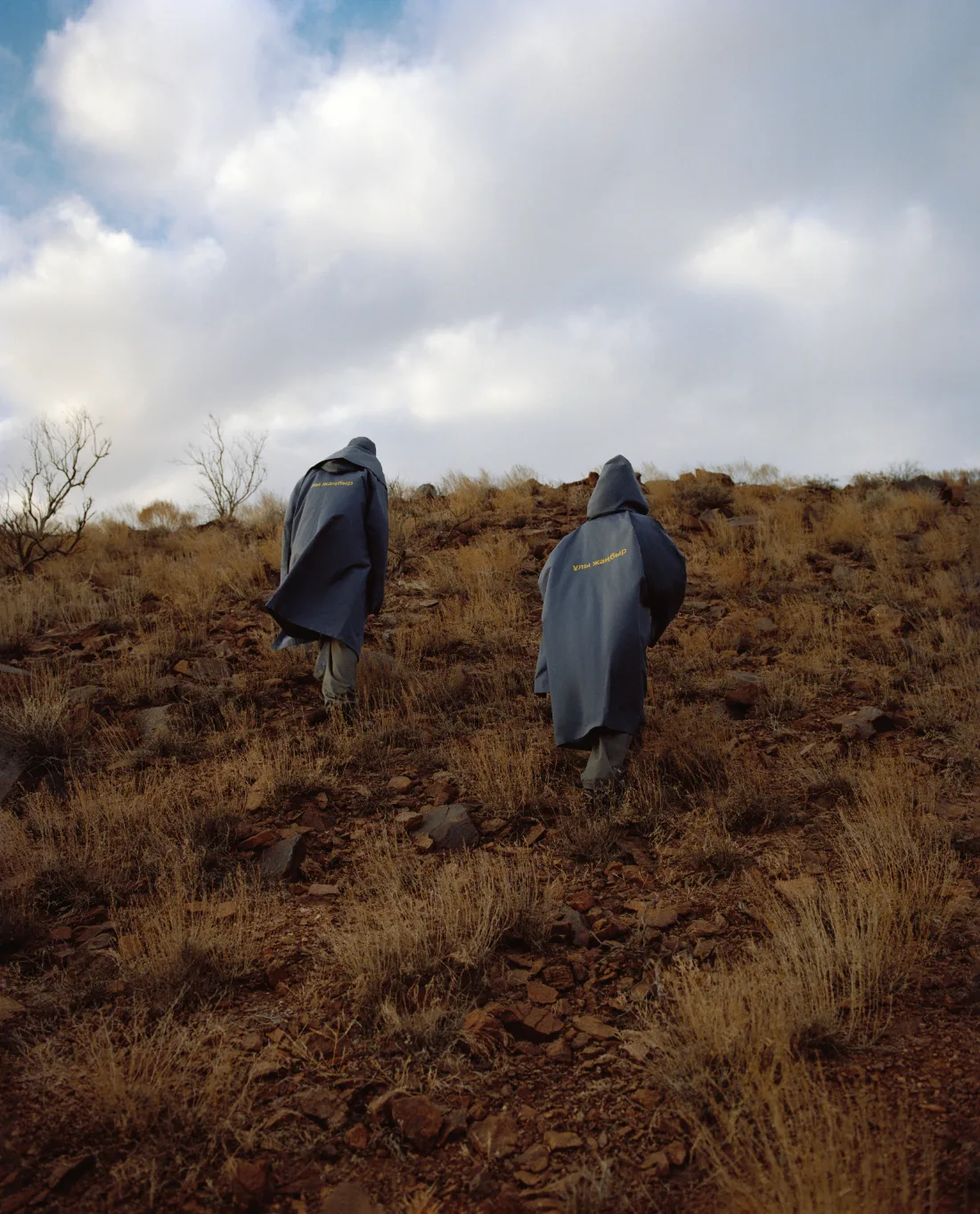 Raincoats cut like Kazakh national dress — 5