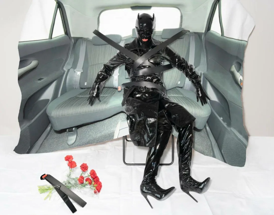 Open-call work: latex figure in a car