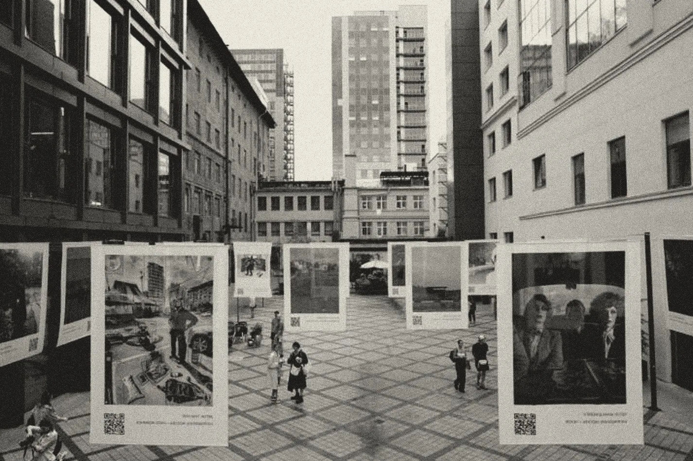 Canvases hung in an art cluster courtyard
